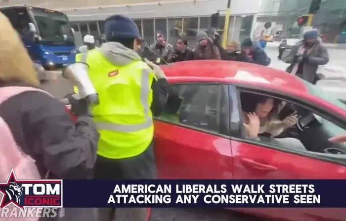 Protesters storm random car for no reason, this is getting tiring