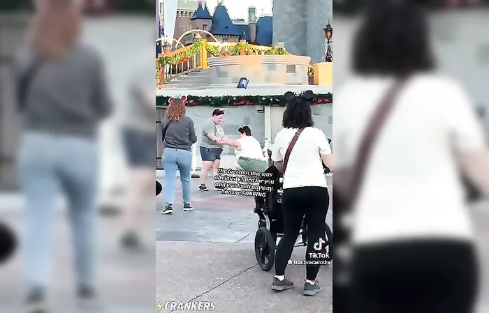 Fat lesbian proposes on one knee at Disneyland, but can't get up