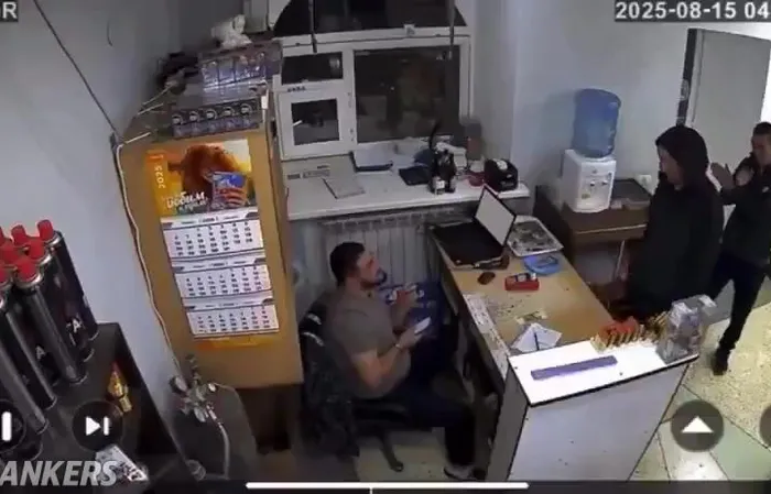 Two guys rob a store at knifepoint, then big dude beats the crap out of them