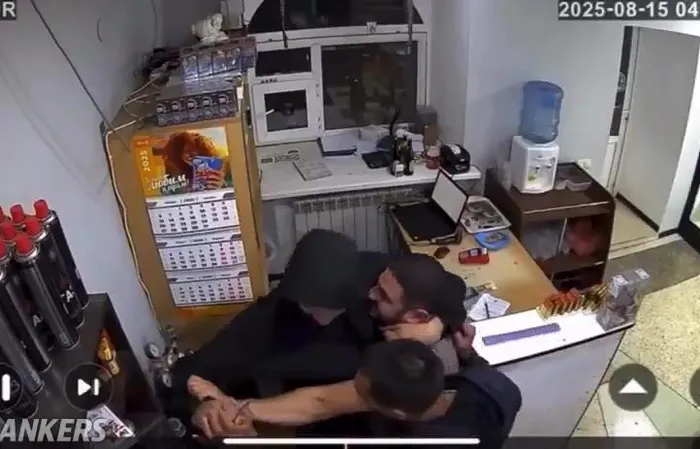 Two guys rob a store at knifepoint, then big dude beats the crap out of them