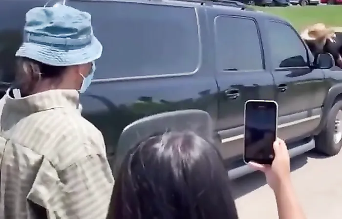 Chaos Erupts as Protesters Leap in Front of ICE Vehicle During Tense Standoff