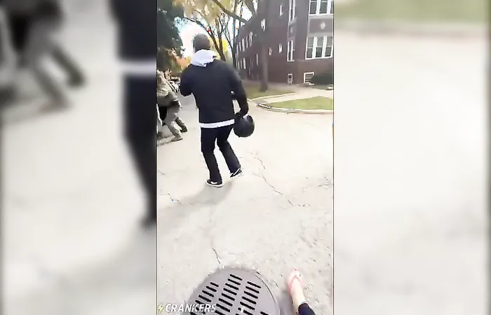 ICE agent shoves a lady who's chasing their vehicle and trying to get in the way