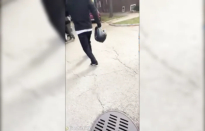 ICE agent shoves a lady who's chasing their vehicle and trying to get in the way