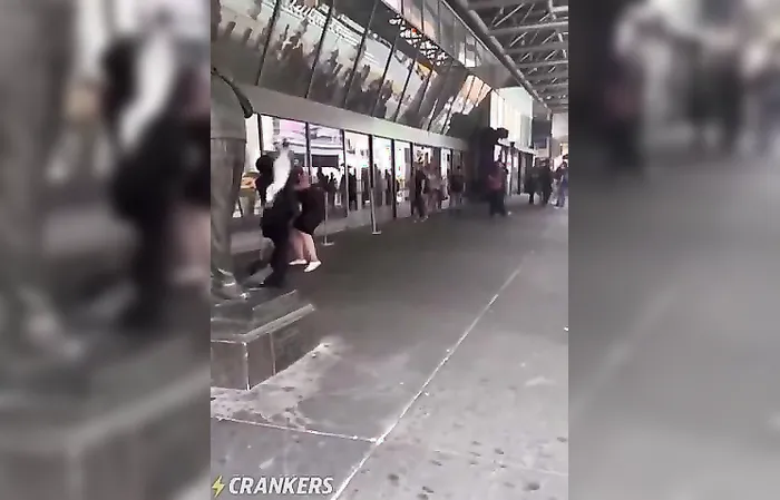 Is that a woman or a man in a dress?