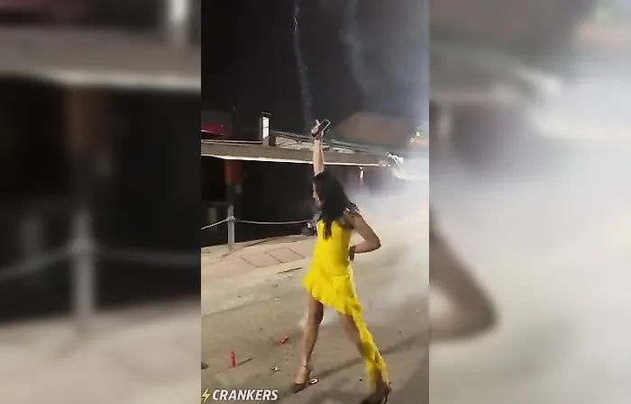 Tight yellow dress activated by fireworks