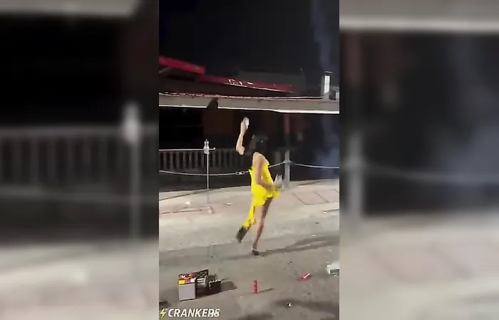 Tight yellow dress activated by fireworks