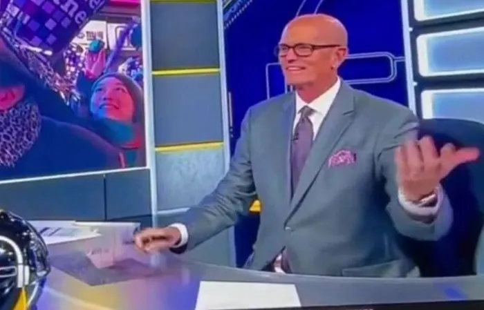 ESPN’s Scott Van Pelt visibly disgusted after two men making out on NYE