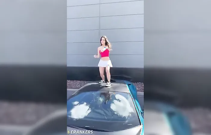 Woman breaks car windshield for a TikTok dance