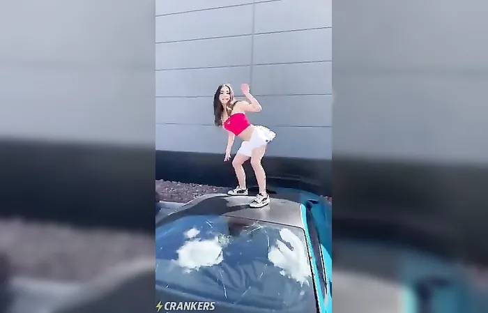 Woman breaks car windshield for a TikTok dance