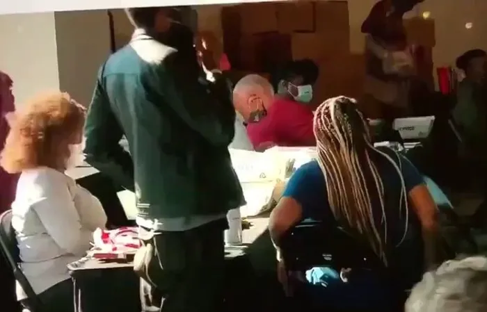 2020 video shows Georgia poll workers passing USB drive suspiciously