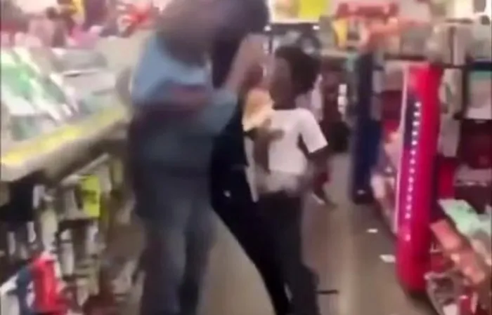 2 hoodrats harass an older guy at the dollar store