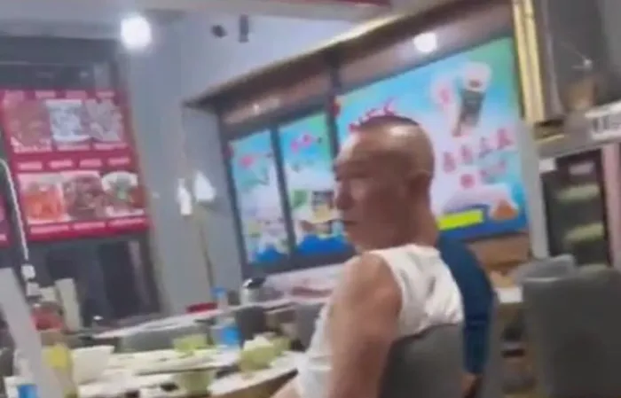 Asian chick tells black folks "go back to your country"