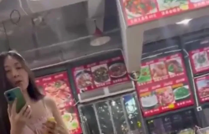 Asian chick tells black folks "go back to your country"