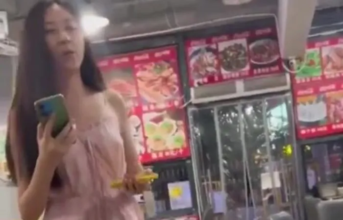 Asian chick tells black folks "go back to your country"