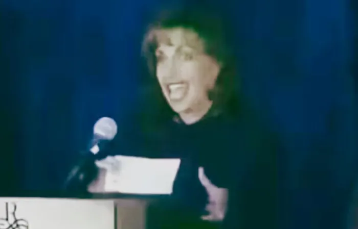 Paula Jones was ALL SMILES taking an $850k check from Bill Clinton