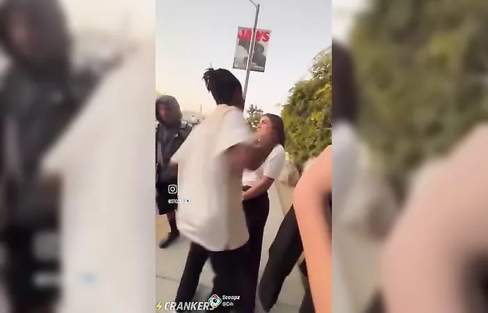 Thug knocks out woman at bus stop for no reason