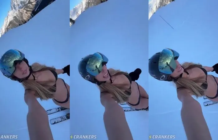 Woman loves skiing in a bikini