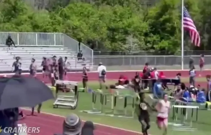 High school runner gets smacked from behind mid-race