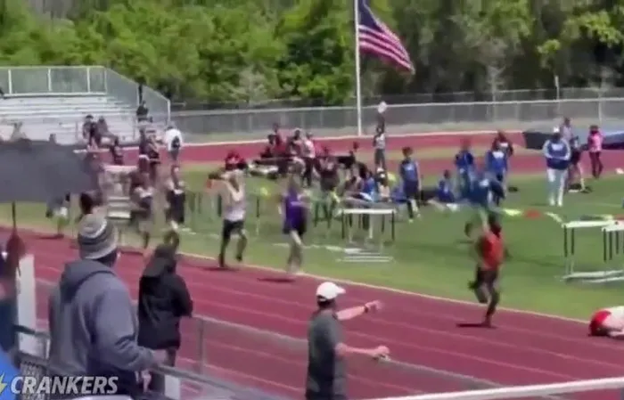 High school runner gets smacked from behind mid-race