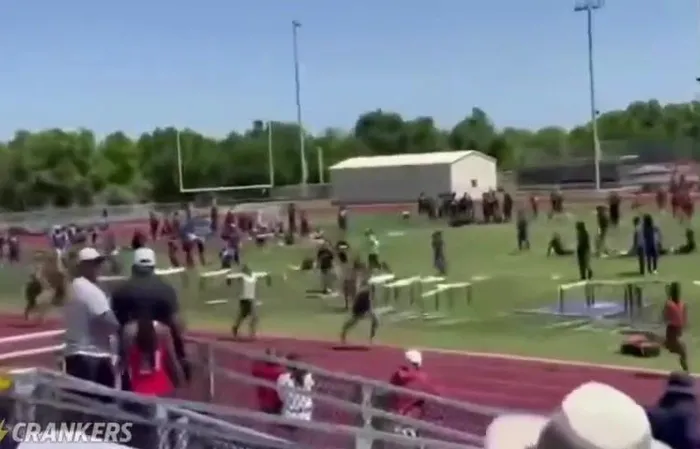 High school runner gets smacked from behind mid-race