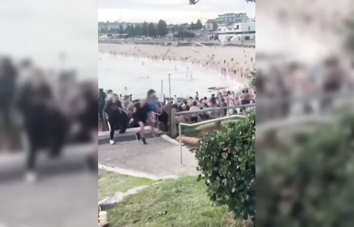 Horrific video shows people scatter during Bondi Beach shooting