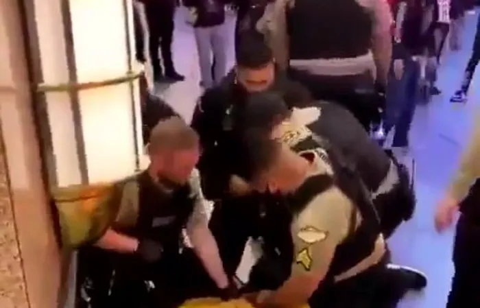 Fight City - Dude pulls of a flying knee on a COP