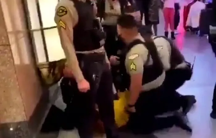 Fight City - Dude pulls of a flying knee on a COP