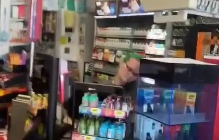 Green-haired woman pepper-sprays guy who keeps harassing her