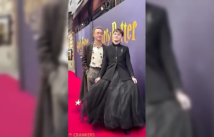 Male Harry Potter star wears a DRESS while being kissed by actor Tom Felton