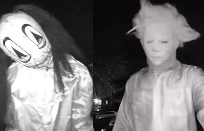 Group in Halloween masks terrorize family