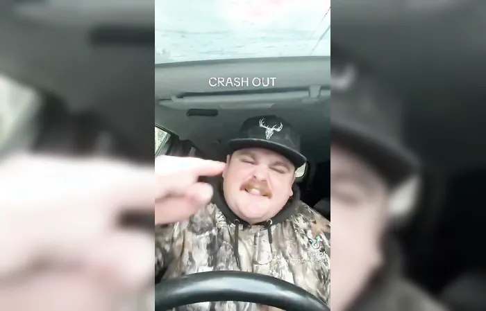 Barely known country singer Bryan Andrews cries in a truck about ICE