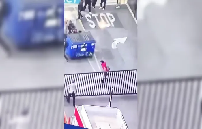 Protesters accidentally hit another protester with a dumpster