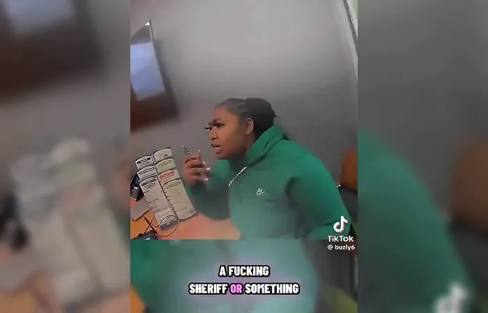 Woman is under arrest for bank fraud throws tantrum