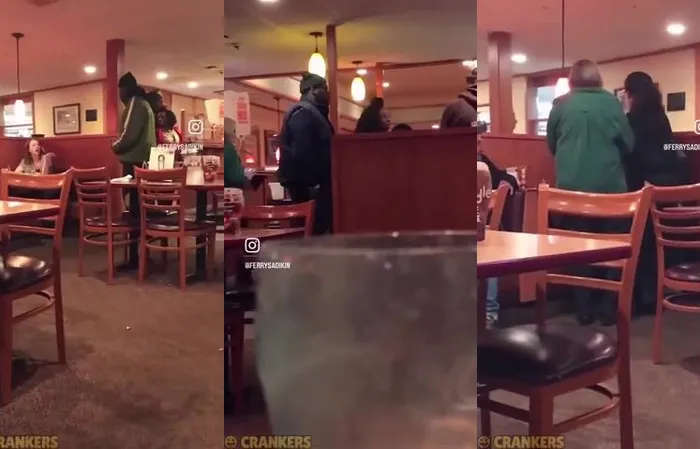 Big dude gets in woman's face at Dennys