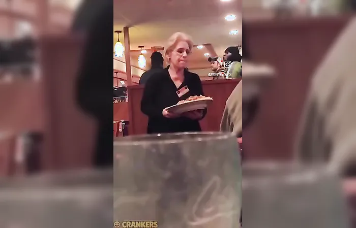 Big dude gets in woman's face at Dennys