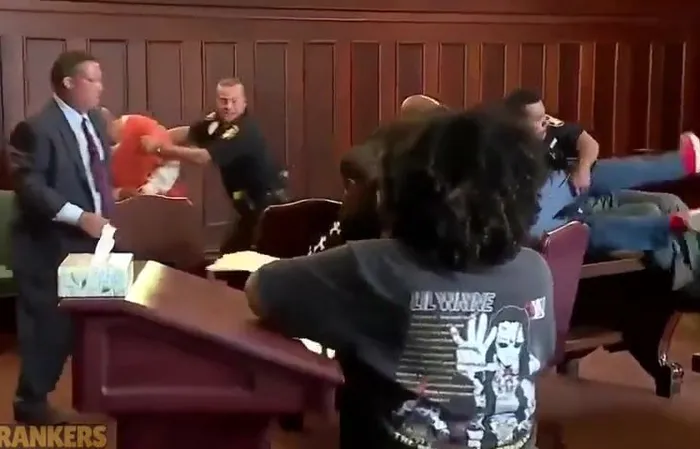 Brothers attacked their mom’s killer in court