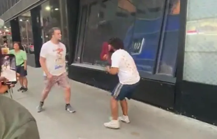 Guy tries stopping fight, ends up knocking dude out instead