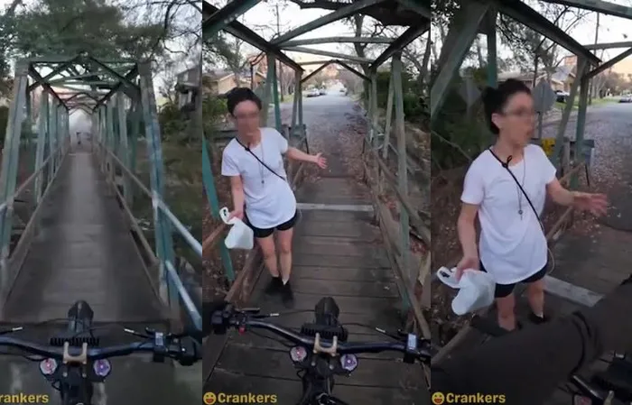 TaraBull - Bridge Karen tries to block a man riding his bike on an unoccupied trail