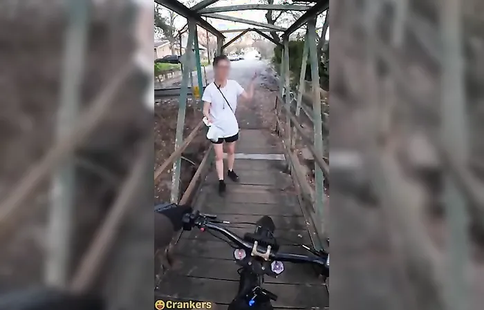 TaraBull - Bridge Karen tries to block a man riding his bike on an unoccupied trail