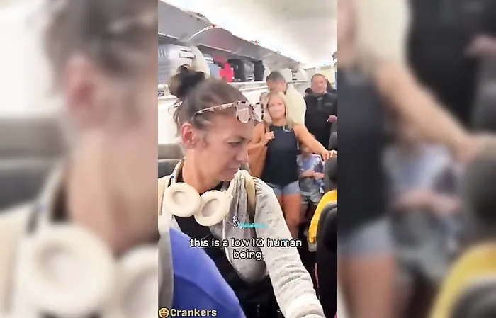 Guy chants "KAREN" at lady who cut line on plane