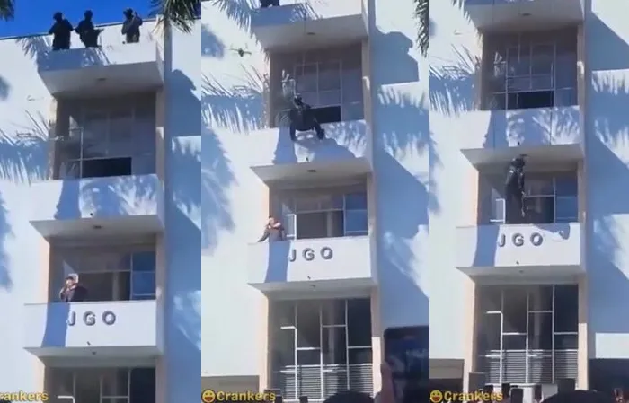 Cop is like spiderman taking out suspect holding someone hostage