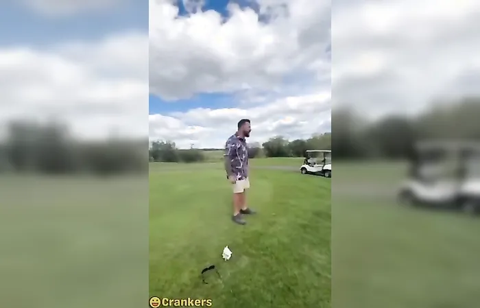 Dude gets THROWN INTO THE LAKE during golf fight