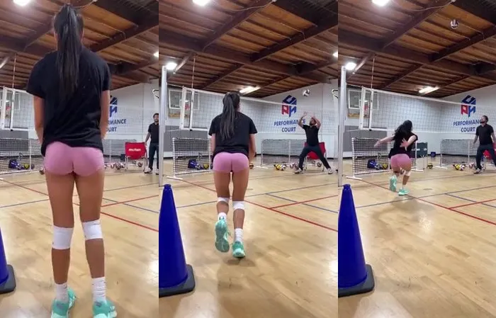 Practicing volleyball serves