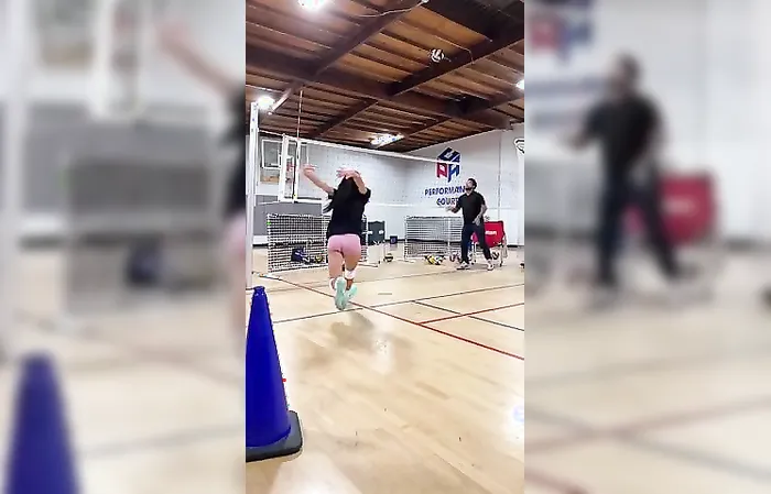 Practicing volleyball serves