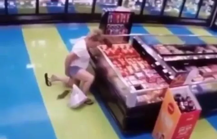 Woman takes a DUMP in super market