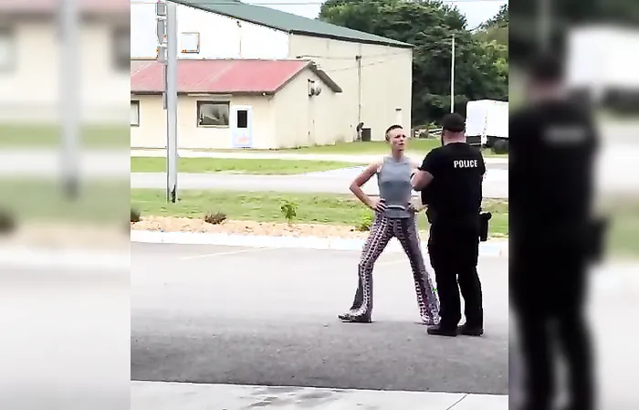 Screeching bald chick gets TASERED