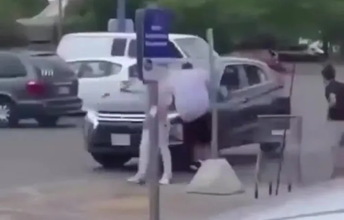 Dude gets hit by car TWICE, goes FLYING across parking lot
