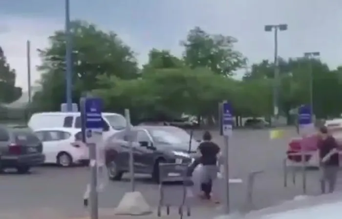 Dude gets hit by car TWICE, goes FLYING across parking lot