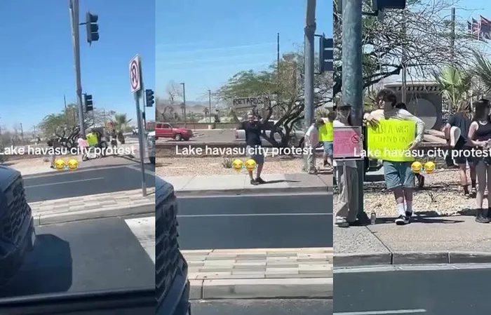 Guy holds up funny sign mocking protesters