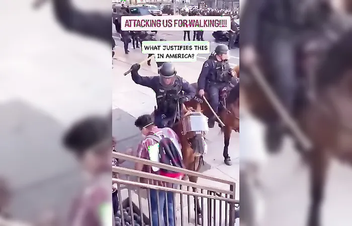 Horse cops beat protesters with sticks